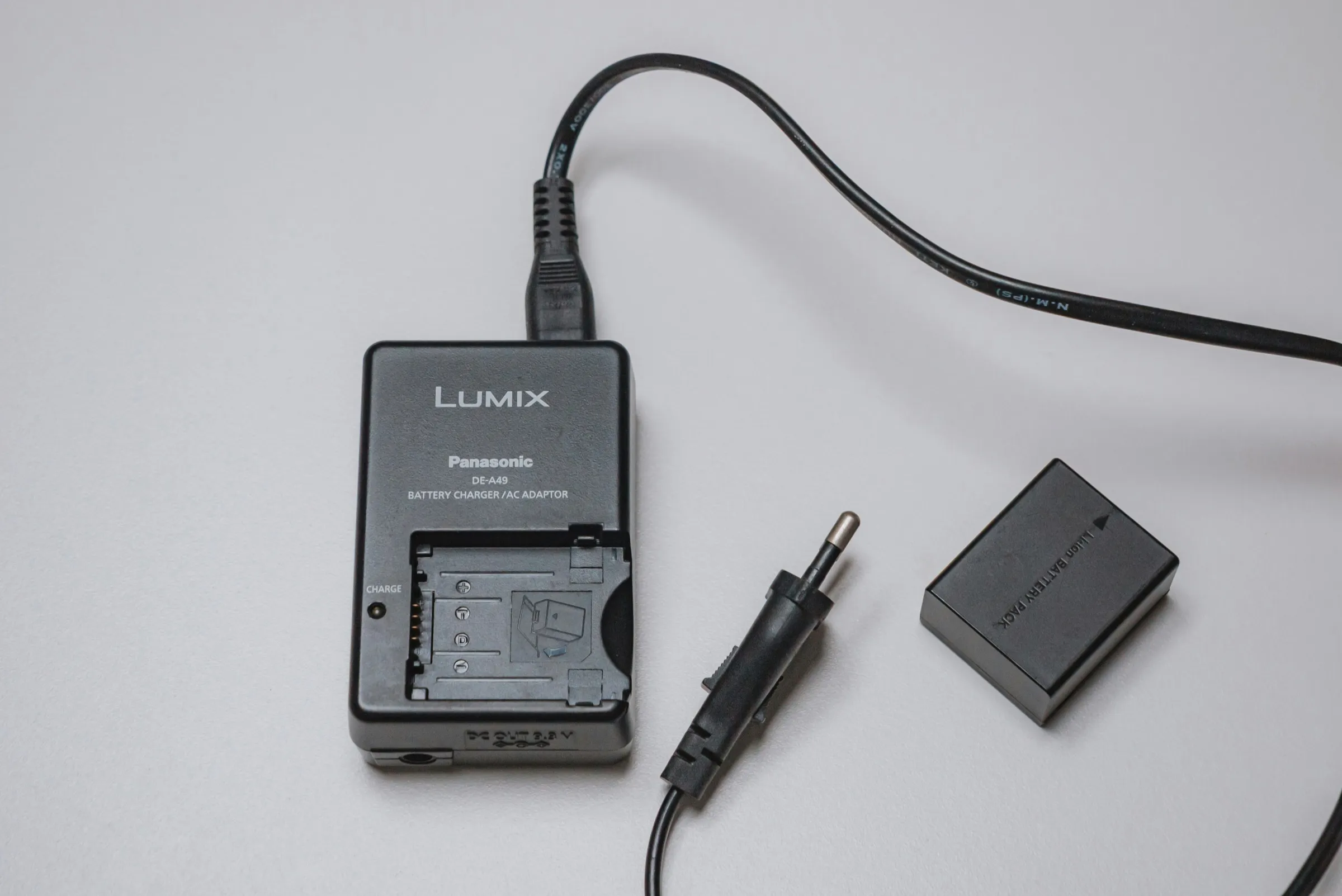 Camera battery charger and spare batteries